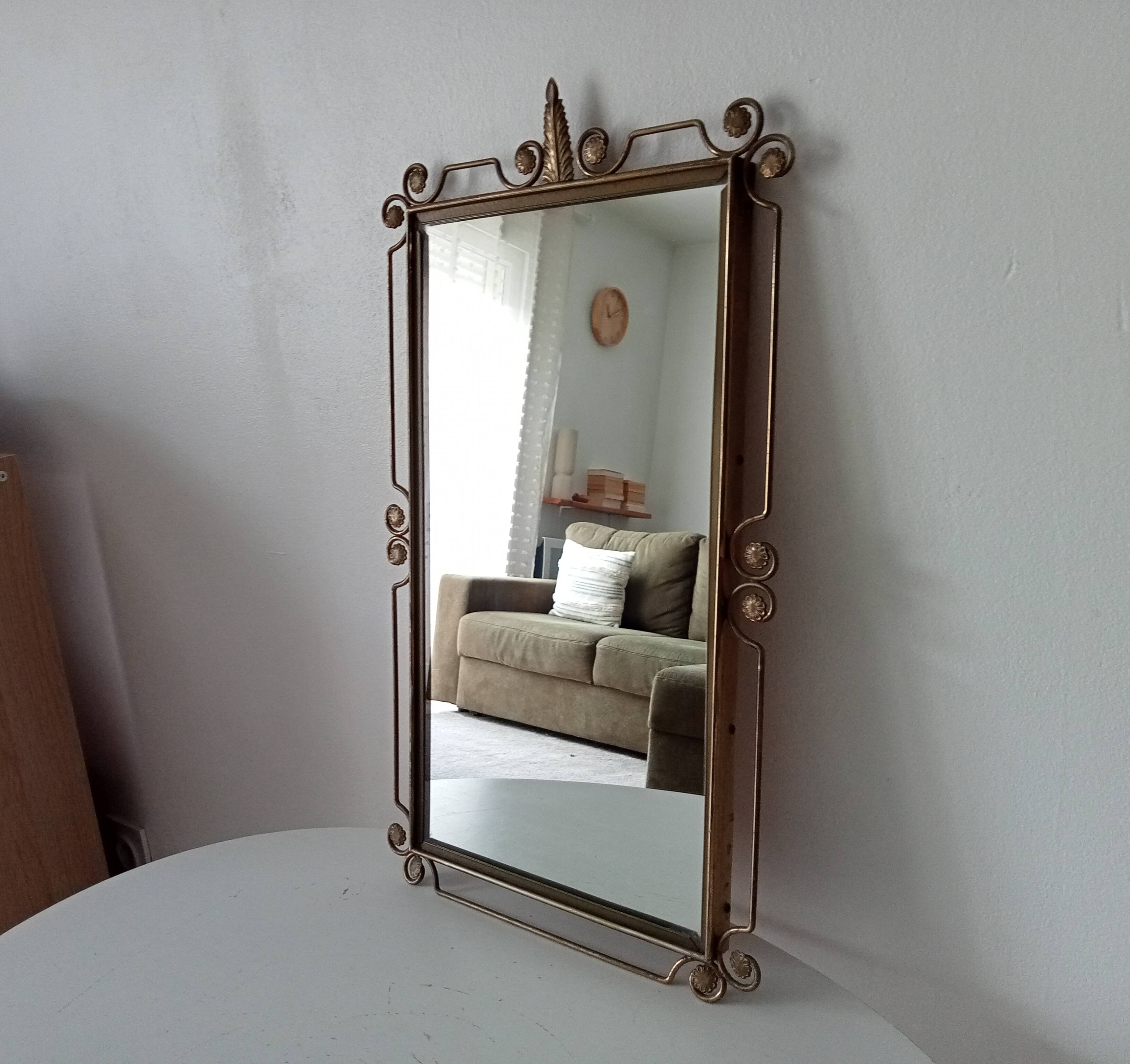 Vintage Hollywood Regency mirror from the 1950s.