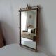 Vintage Hollywood Regency mirror from the 1950s.
