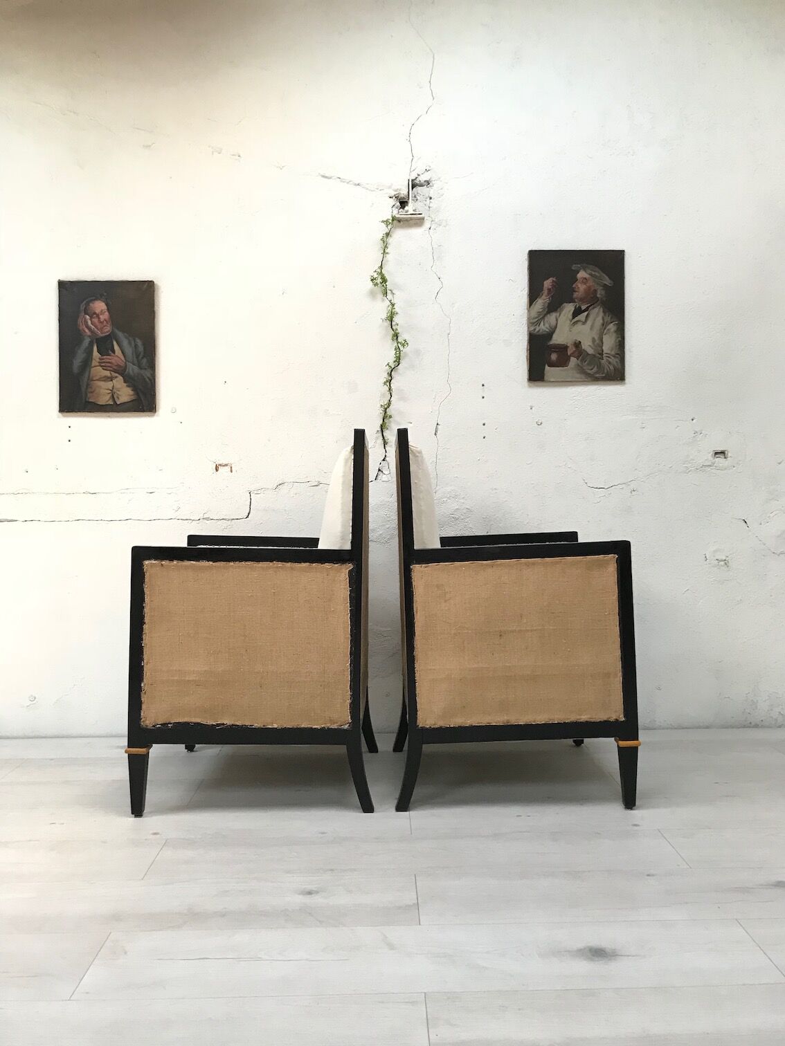 Pair of blackened wooden armchairs
