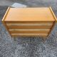 Vintage oak and cane commode from the 1960s.