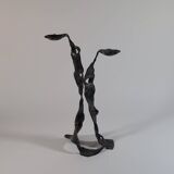 Sculptural brutalist floor candle holder made of hand-forged iron from the 1950s.