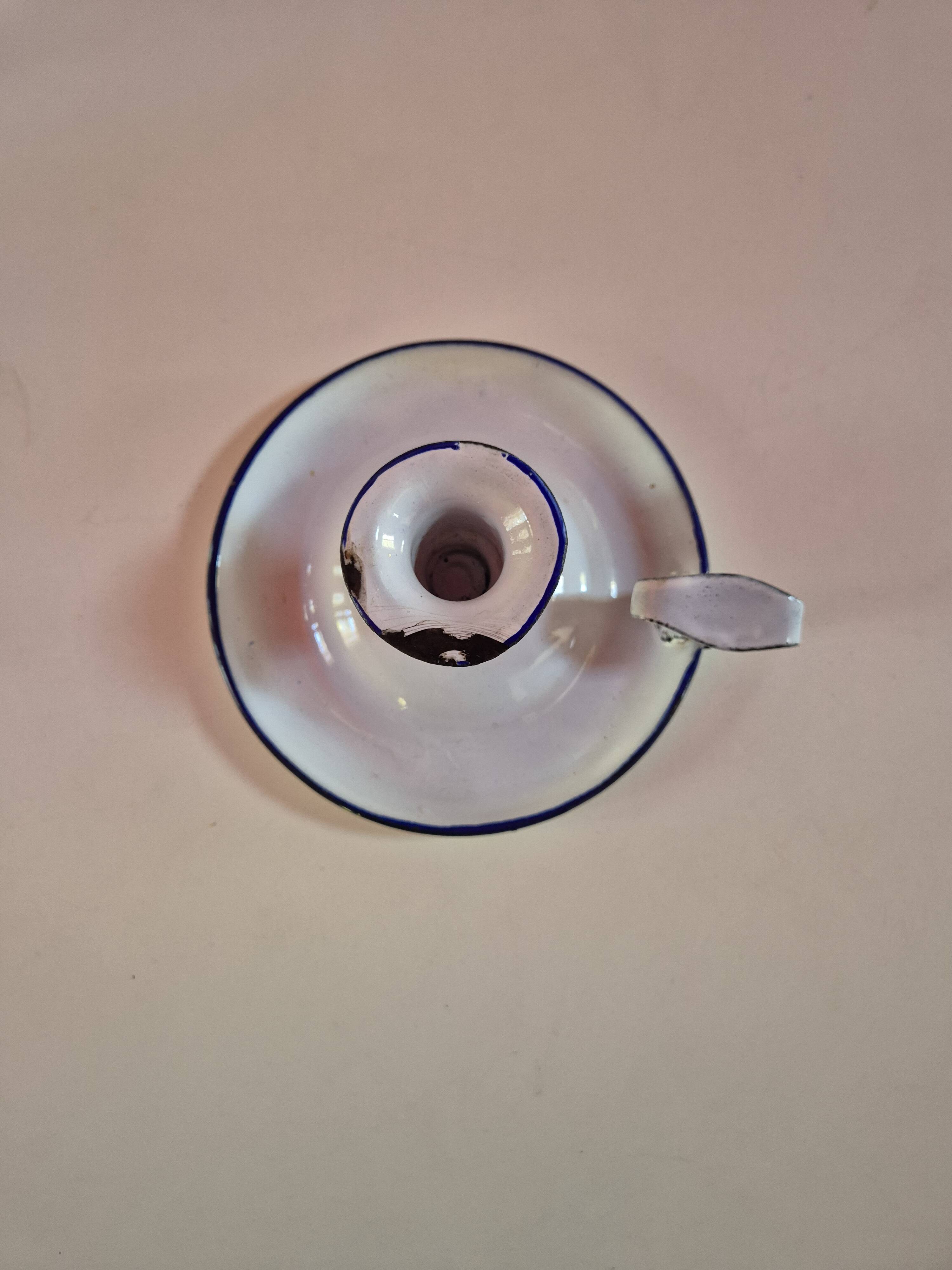 white enamelled metal candle holder with blue edges
