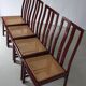 4 Glossy wine red cane seat chairs | Italy | 1970s