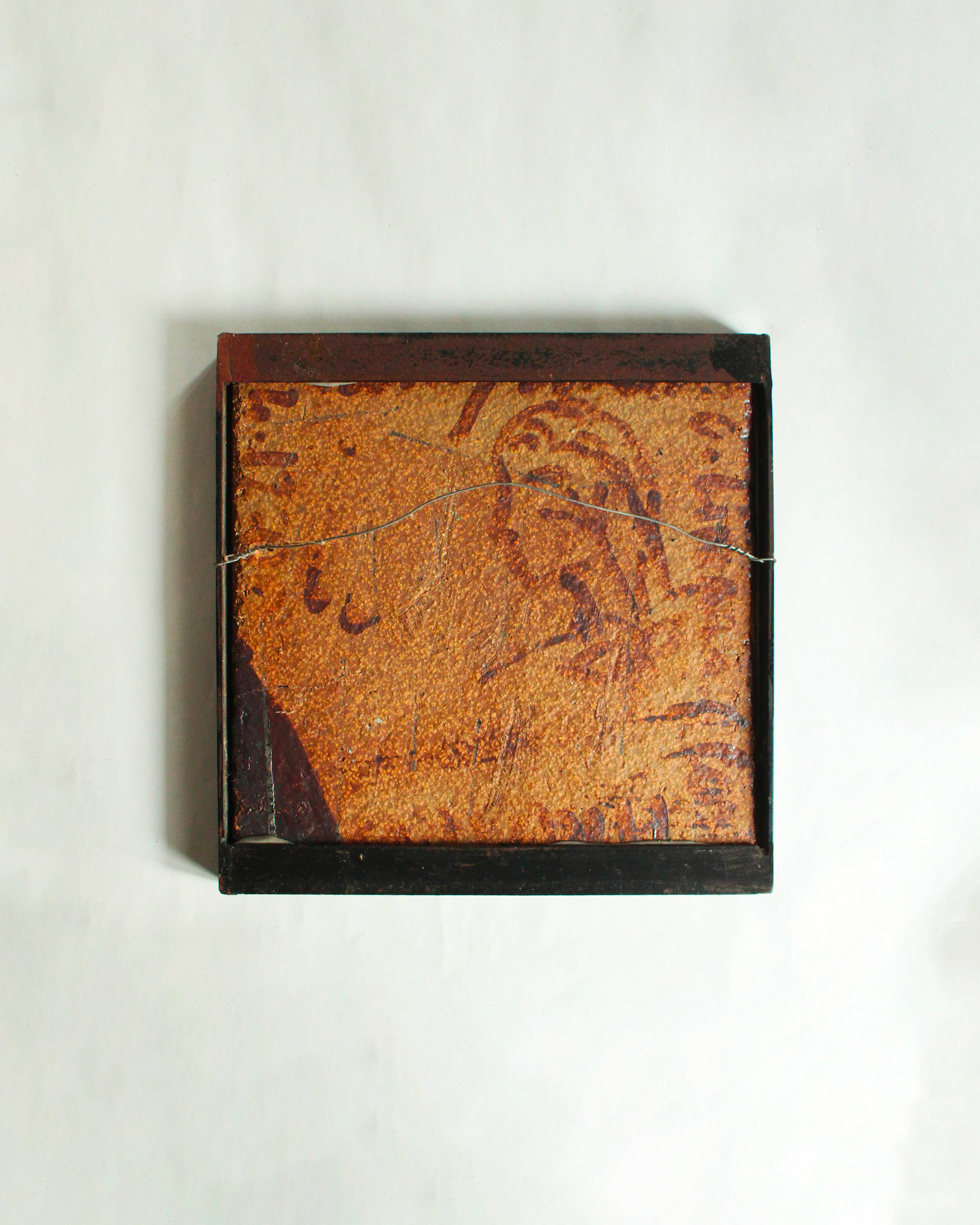 Glazed chamotte clay plaque in grey-green and black, decorated with a rower.