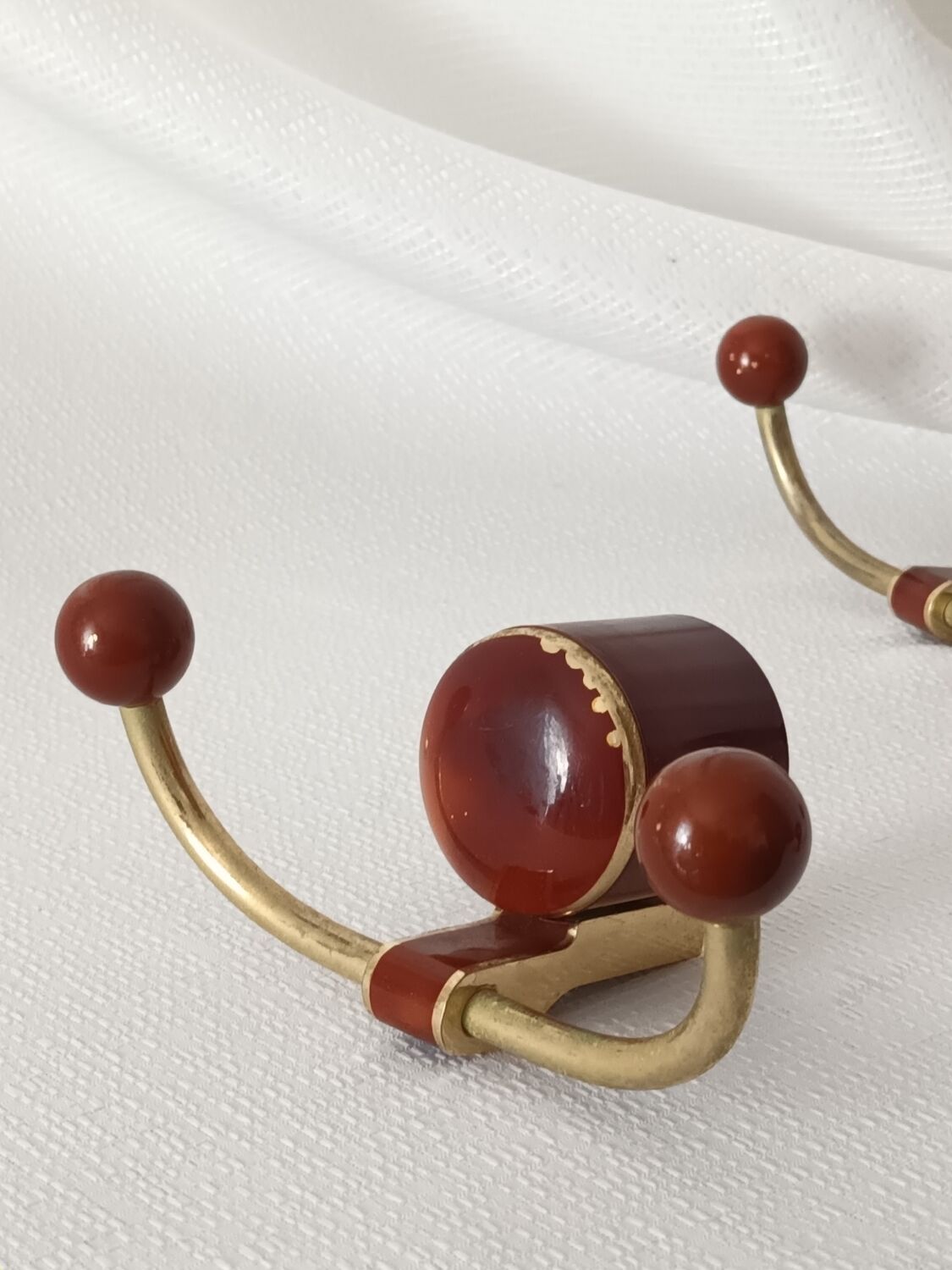 Art deco bakelite brass hooks