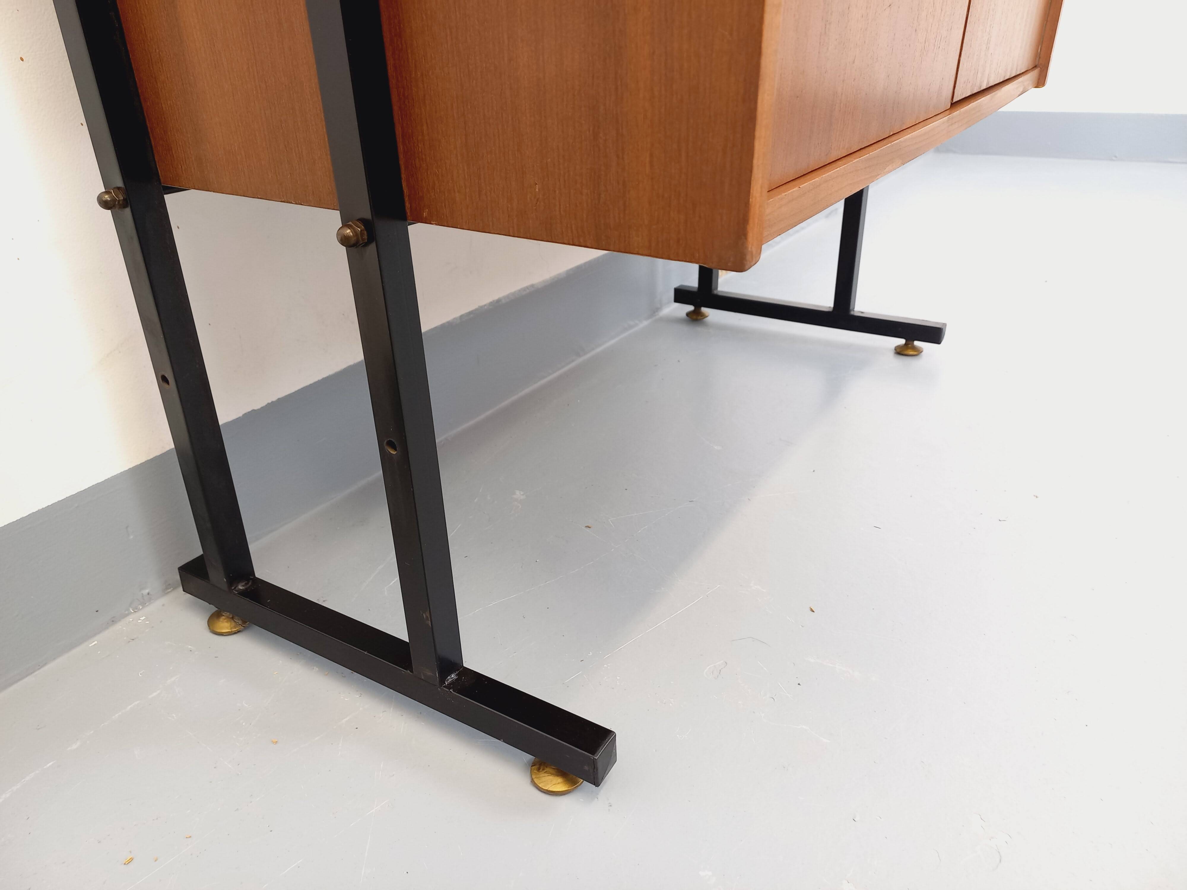 Vintage modular secretary bookshelf in teak and metal.