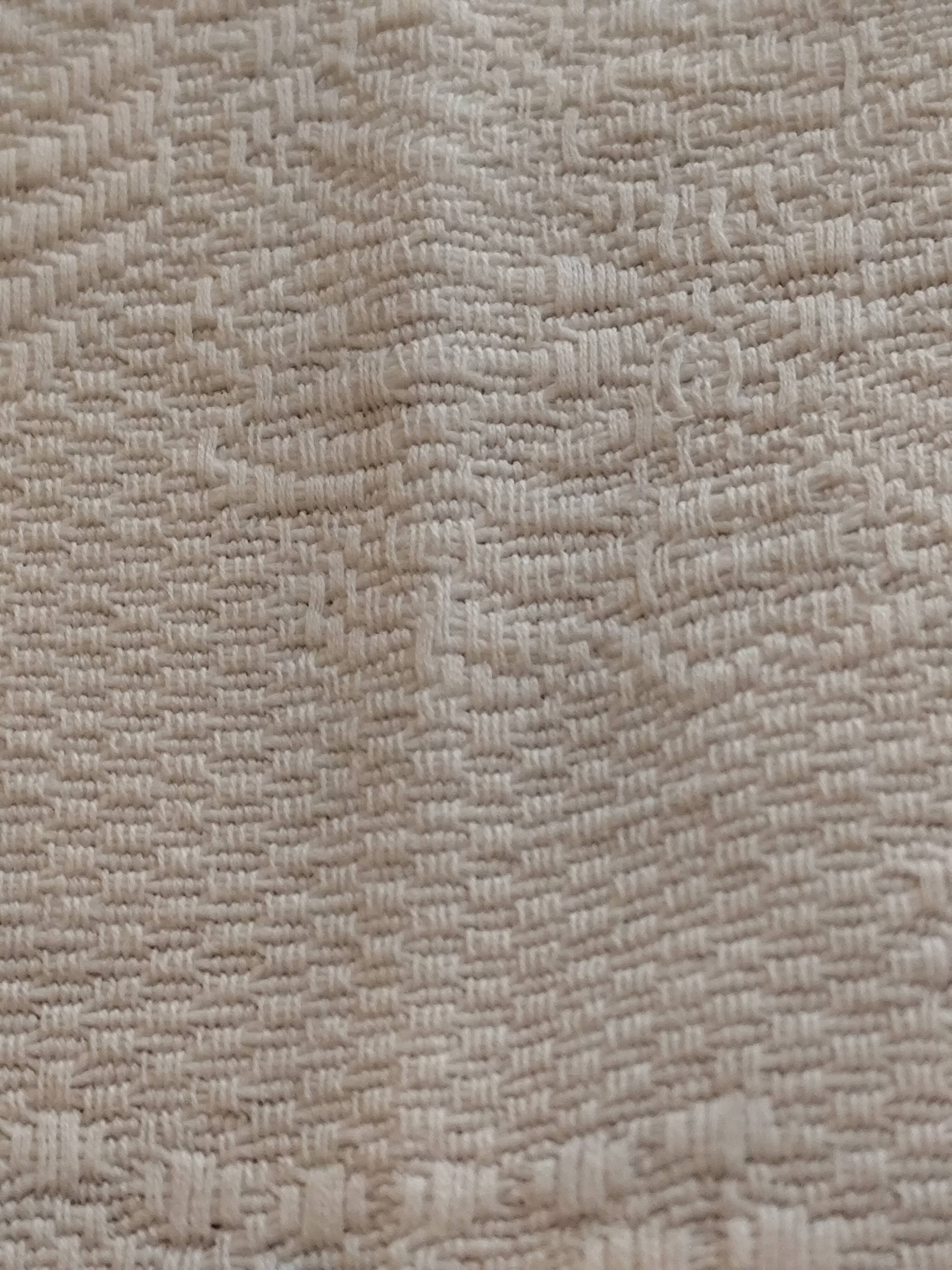 White woven cotton bedspread with fringes