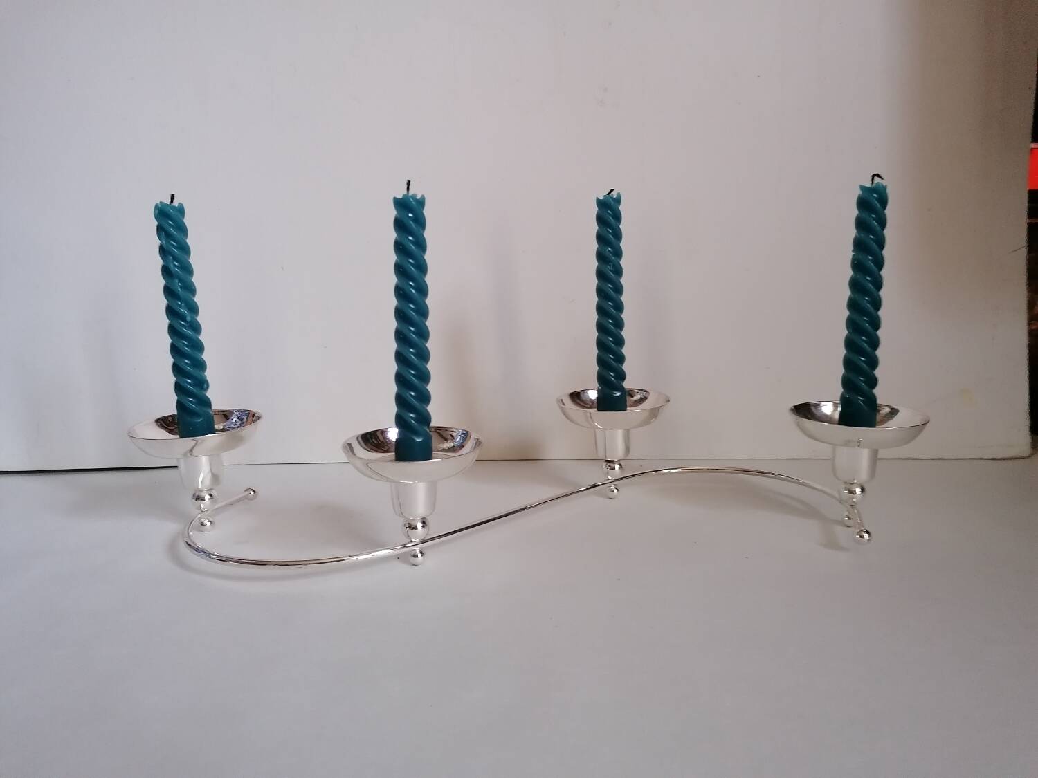 4-light silver metal candle holder