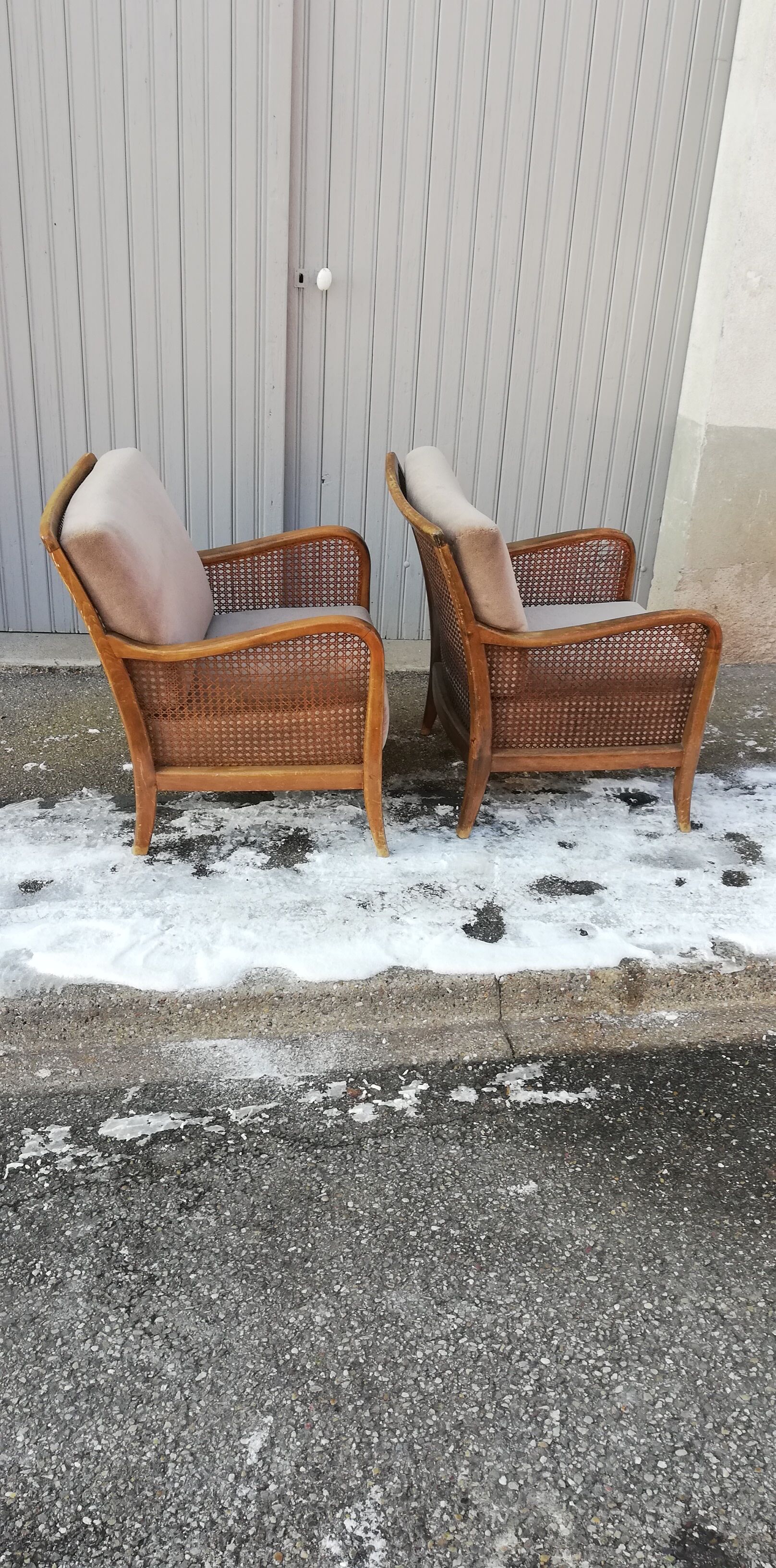 Pair of vintage cannage and fabric armchairs