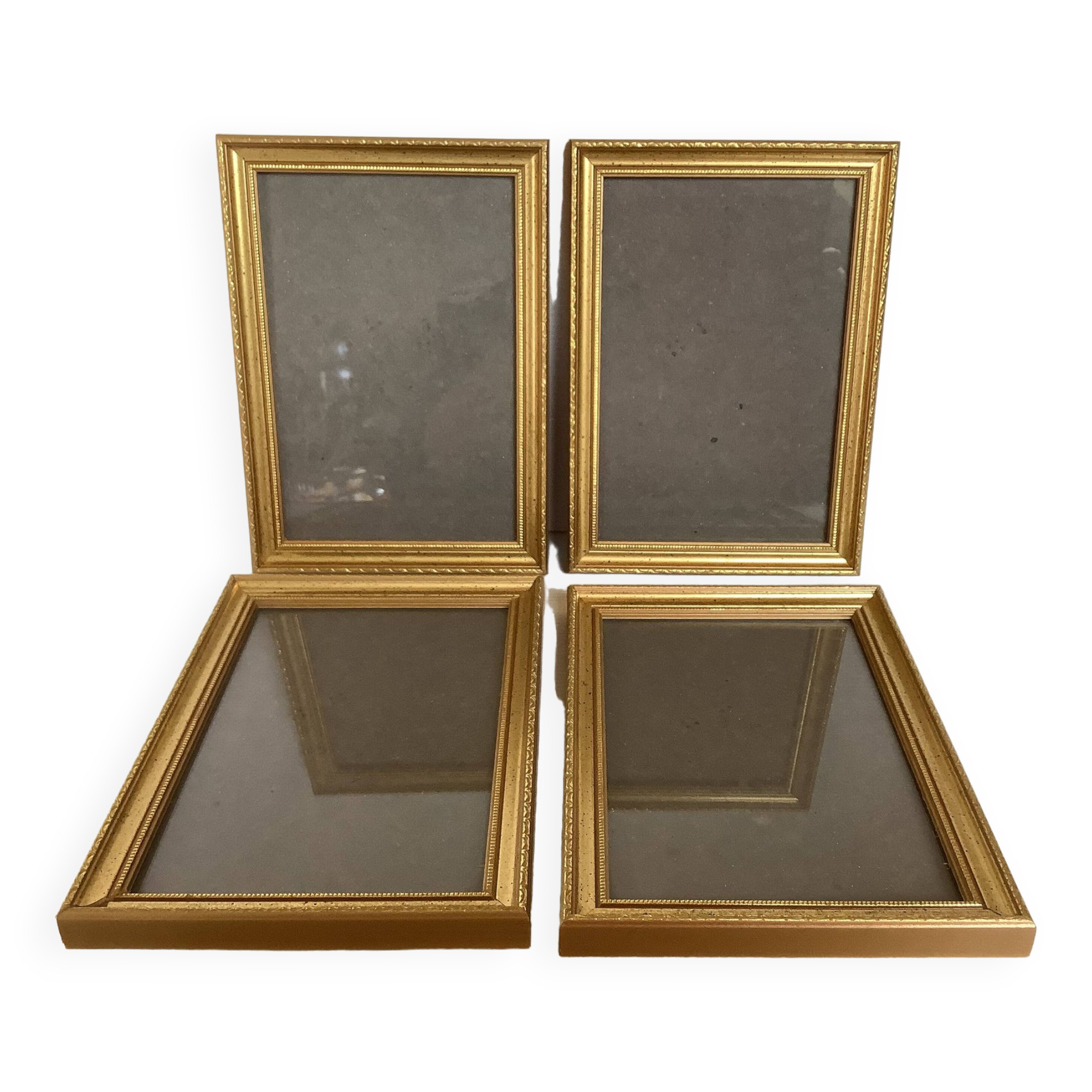 Four gilded wood frames to place or hang