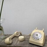 Vintage beige rotary telephone