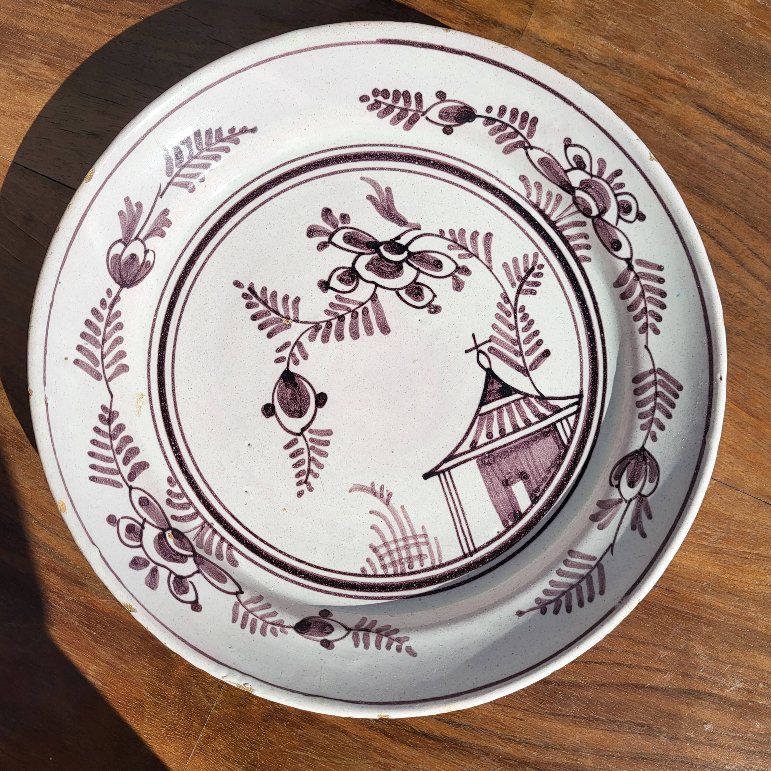 Grand Feu earthenware plate, Manganese decoration - 18th century