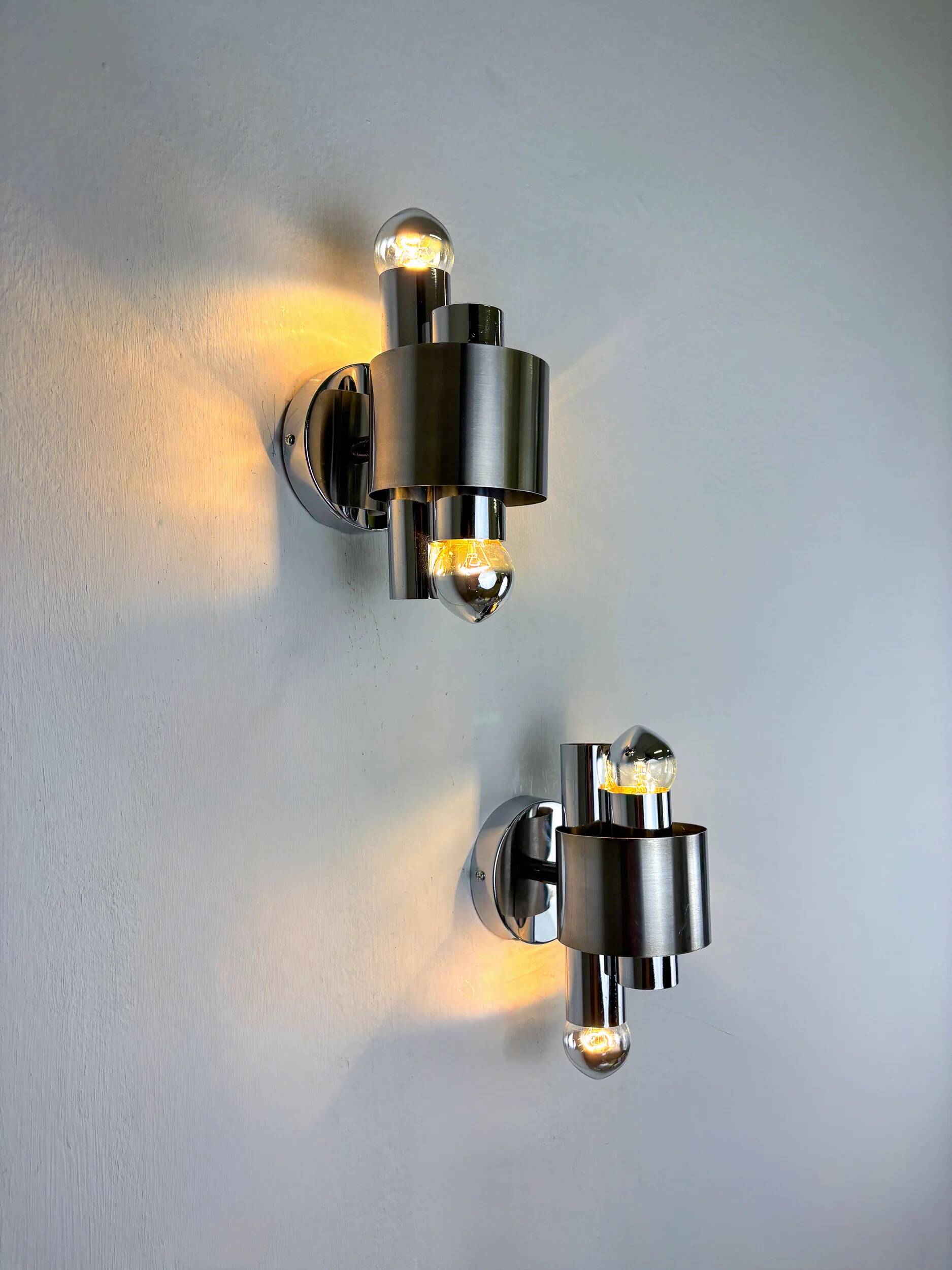 Pair of space age 2-light wall sconces, chromed metal, Italy, 1970s
