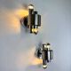 Pair of space age 2-light wall sconces, chromed metal, Italy, 1970s