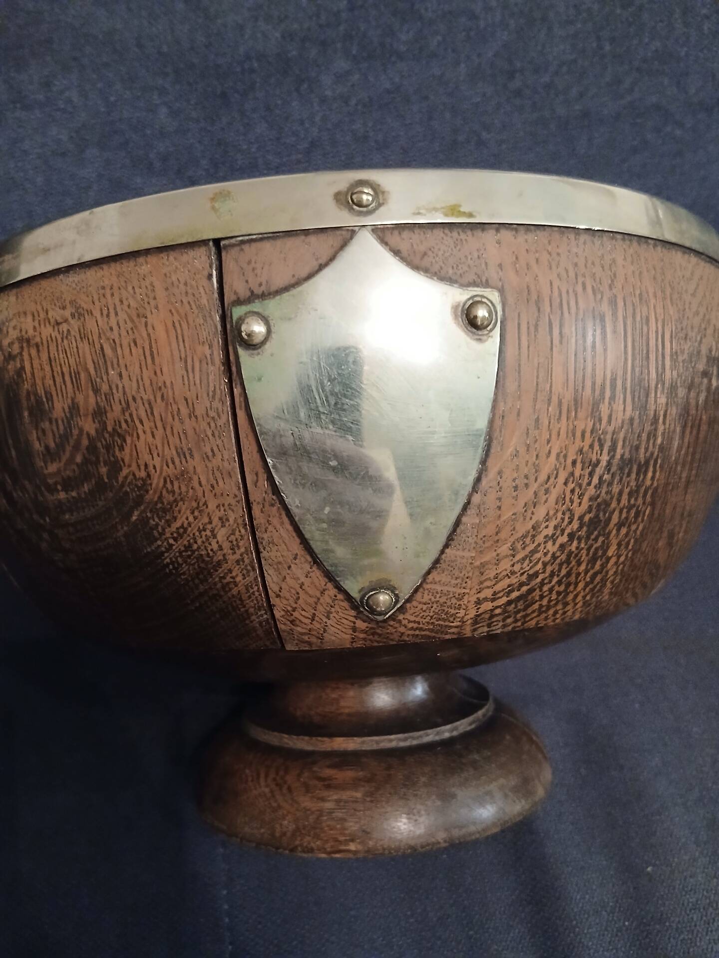 Victorian era silver-plated bowl with oak wood.