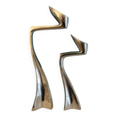 Set of 2 Swann candle holders by Matthew Hilton