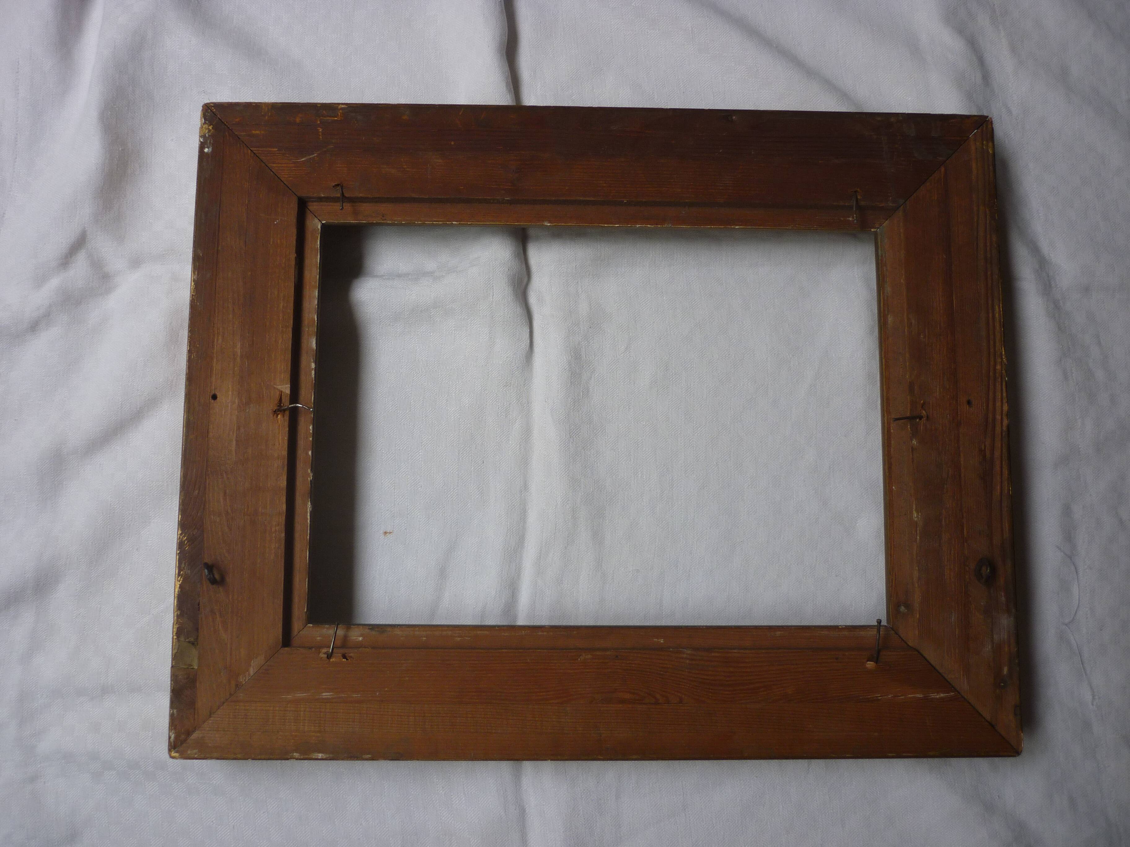 Gilded wood and stucco frame