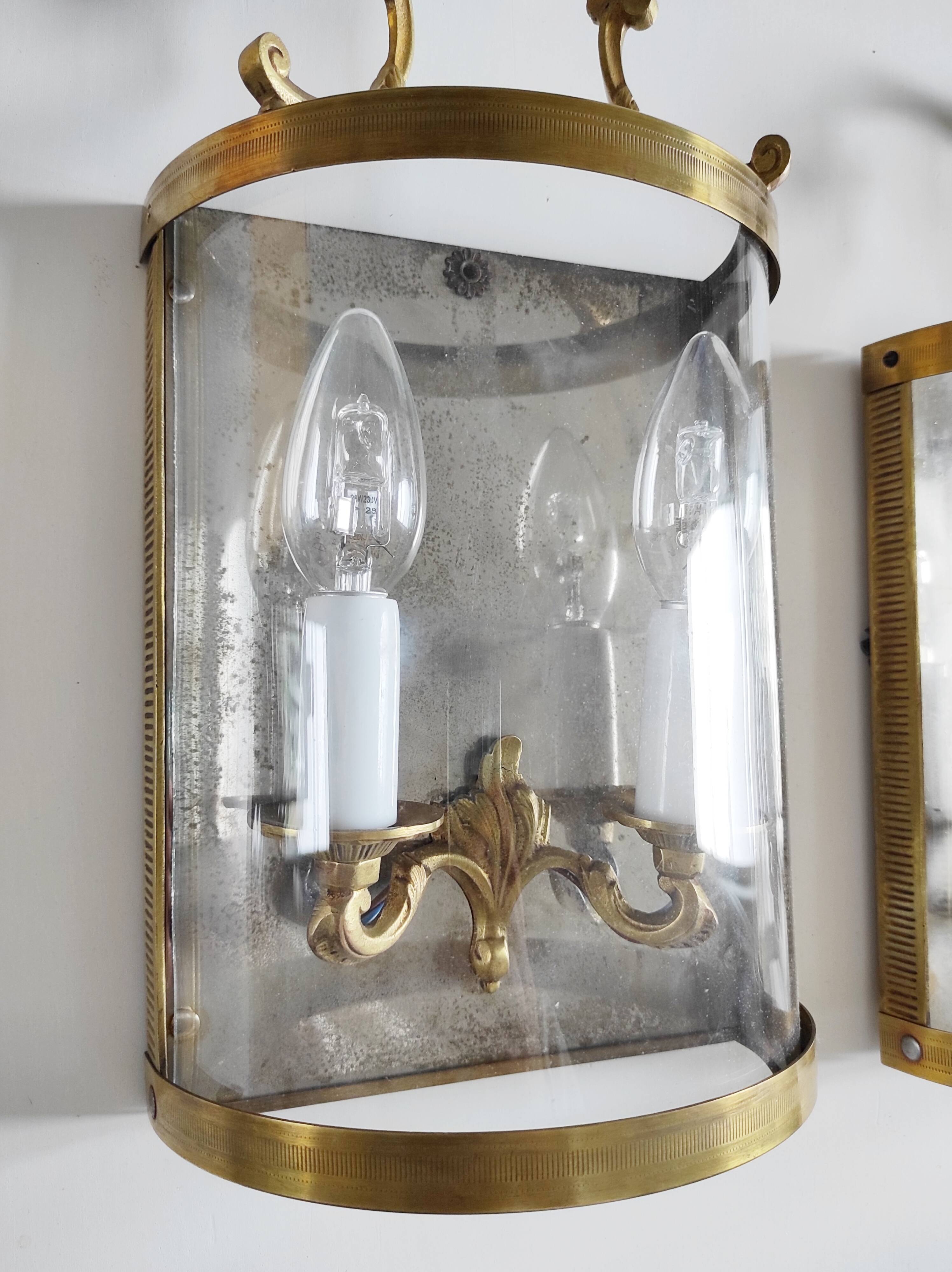 Pair of two-light wall sconces