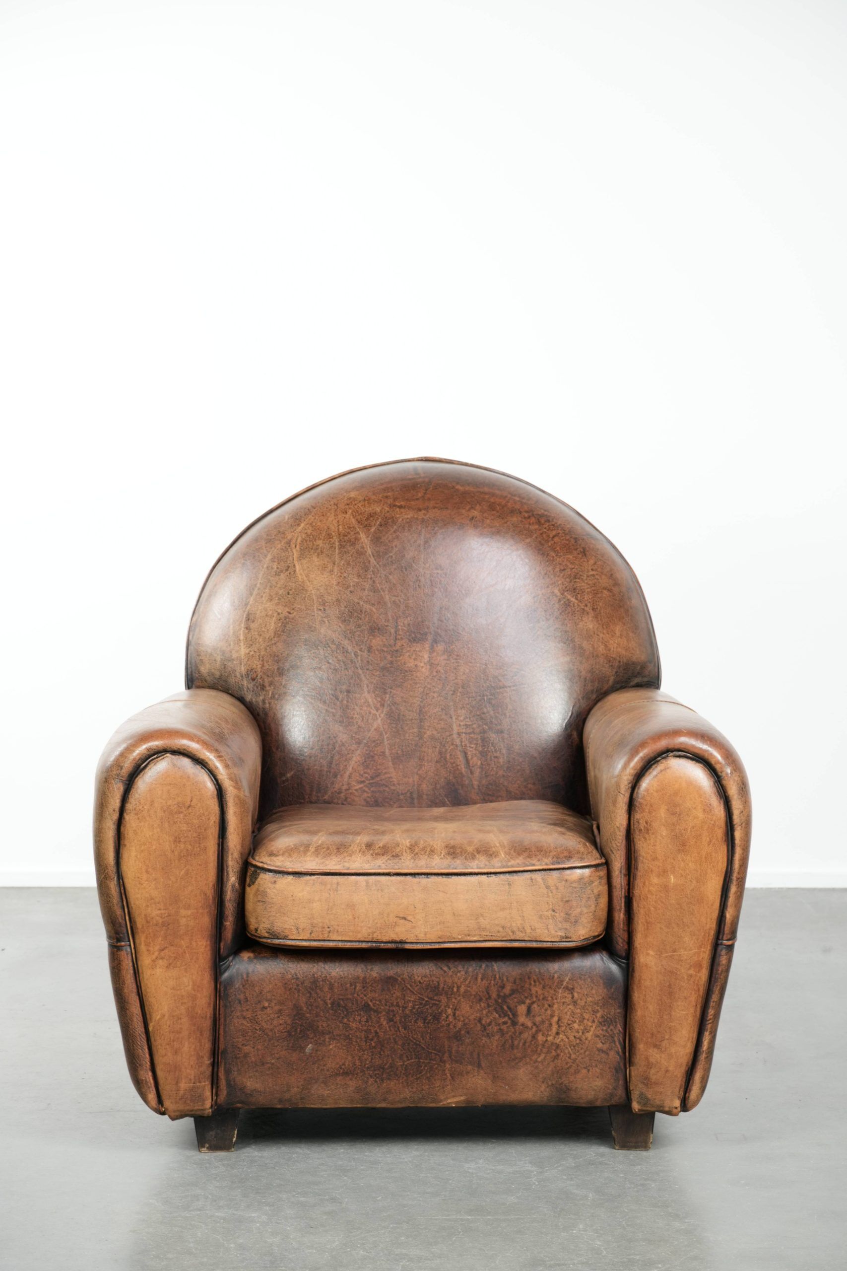 Armchair made of sheepskin leather in Art Deco design with beautiful patina