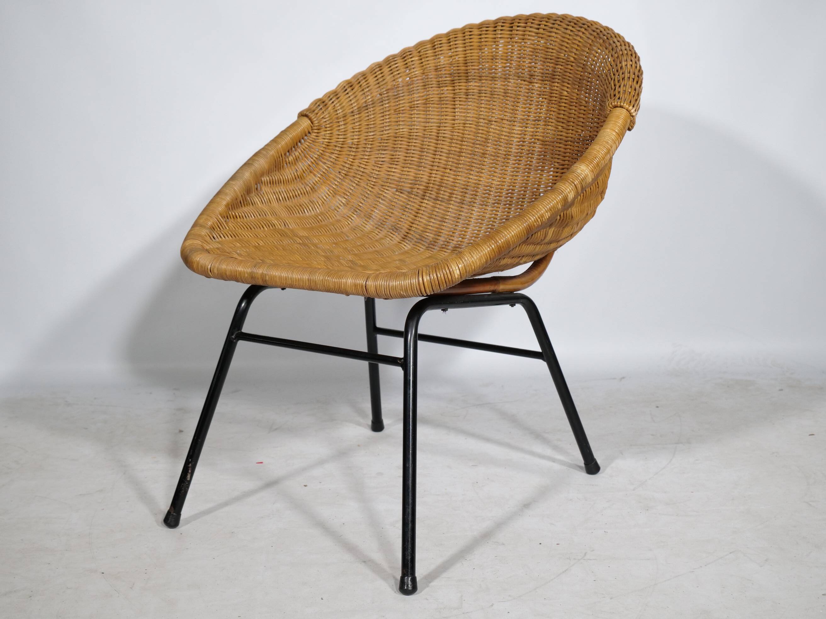 Woven rattan armchair from the 1960s