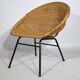 Woven rattan armchair from the 1960s