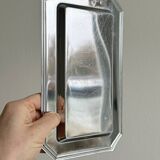 Small rectangular tray made of lightweight metal.