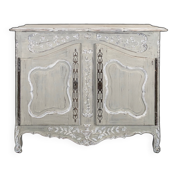 Provençal buffet in richly carved Louis XV style with a grey patina.