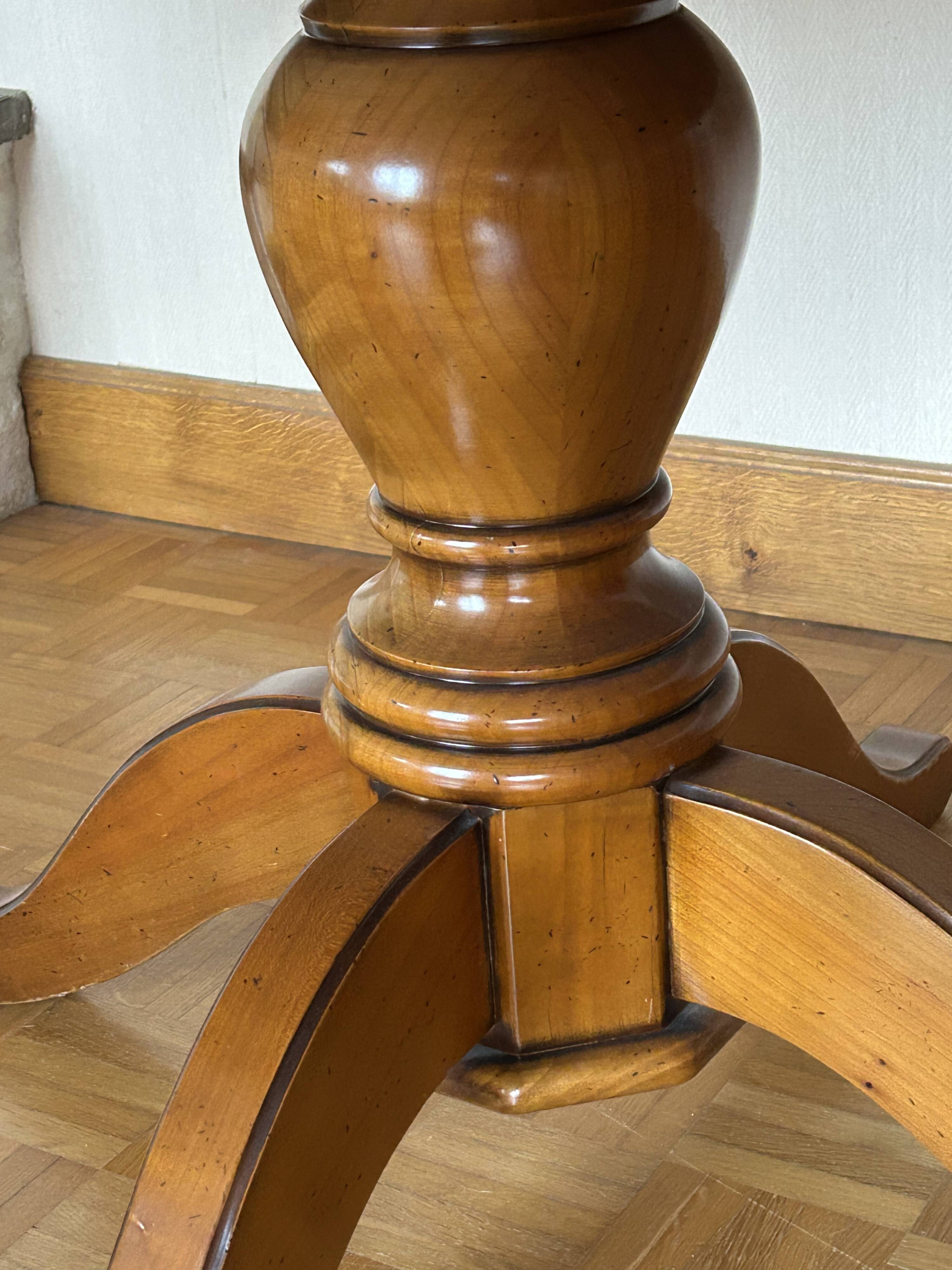 Louis Philippe solid cherry table with 2 extensions.