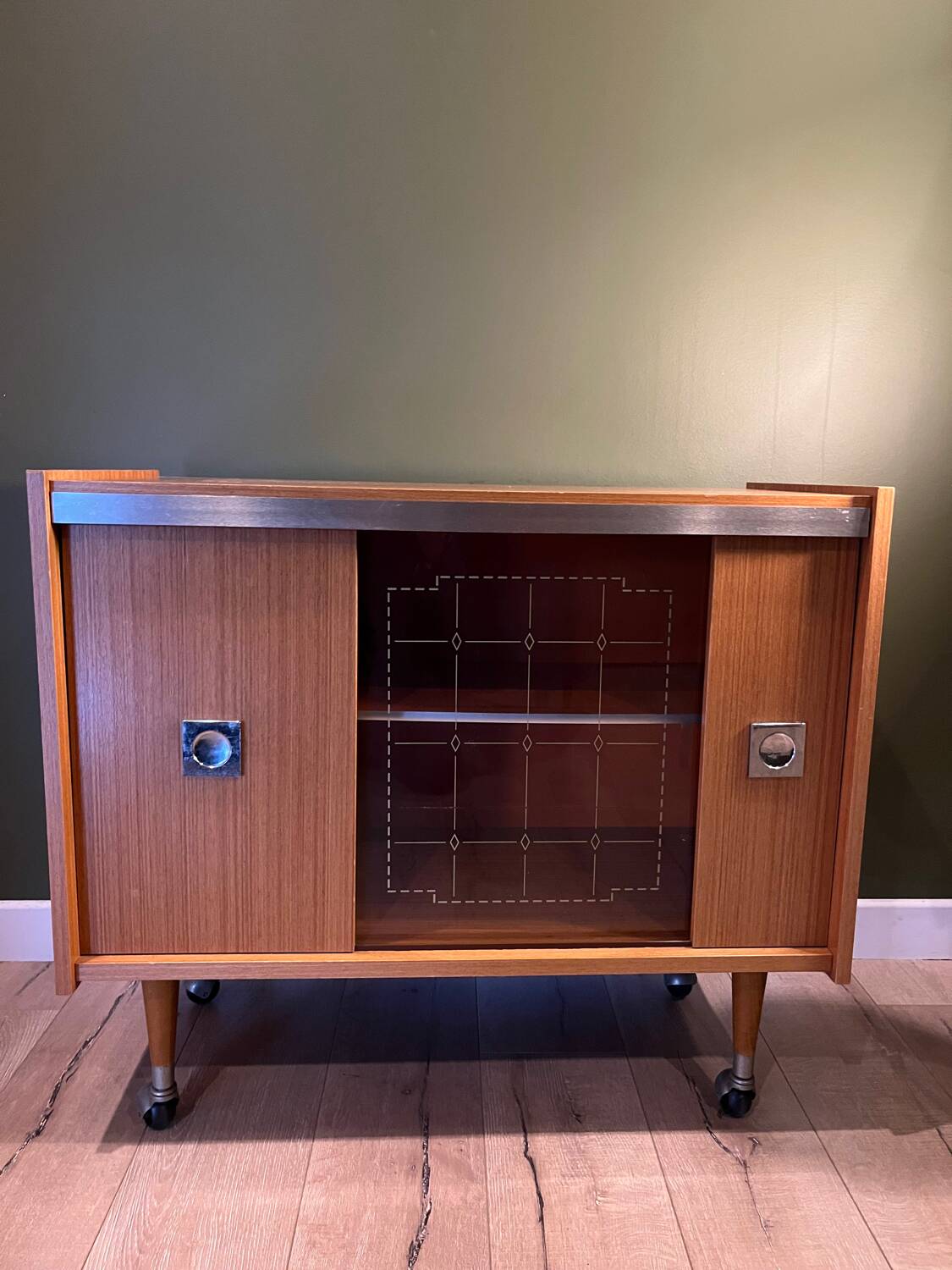 Vintage 1960s bar cabinet, Scandinavian style, on wheels.