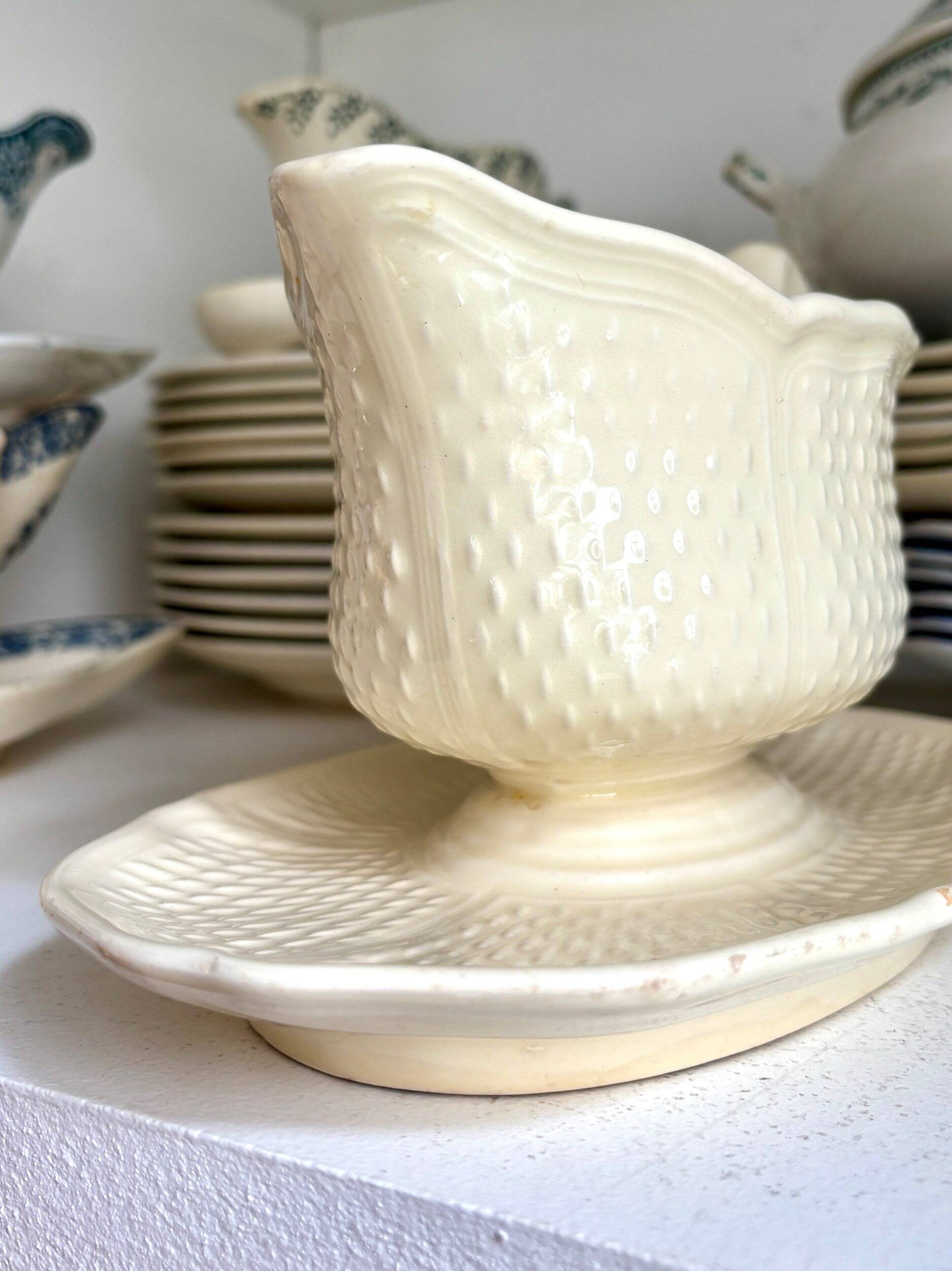 Gien earthenware sauceboat, "Pont aux choux" service