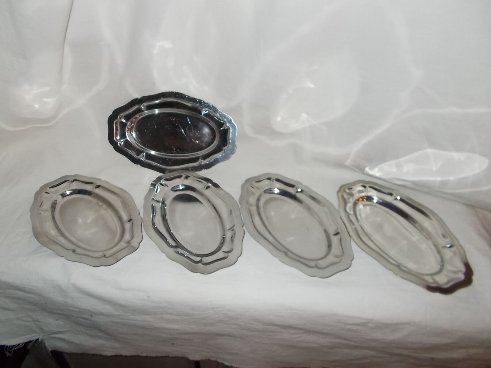 Lot of 5 oval raviers in stainless steel