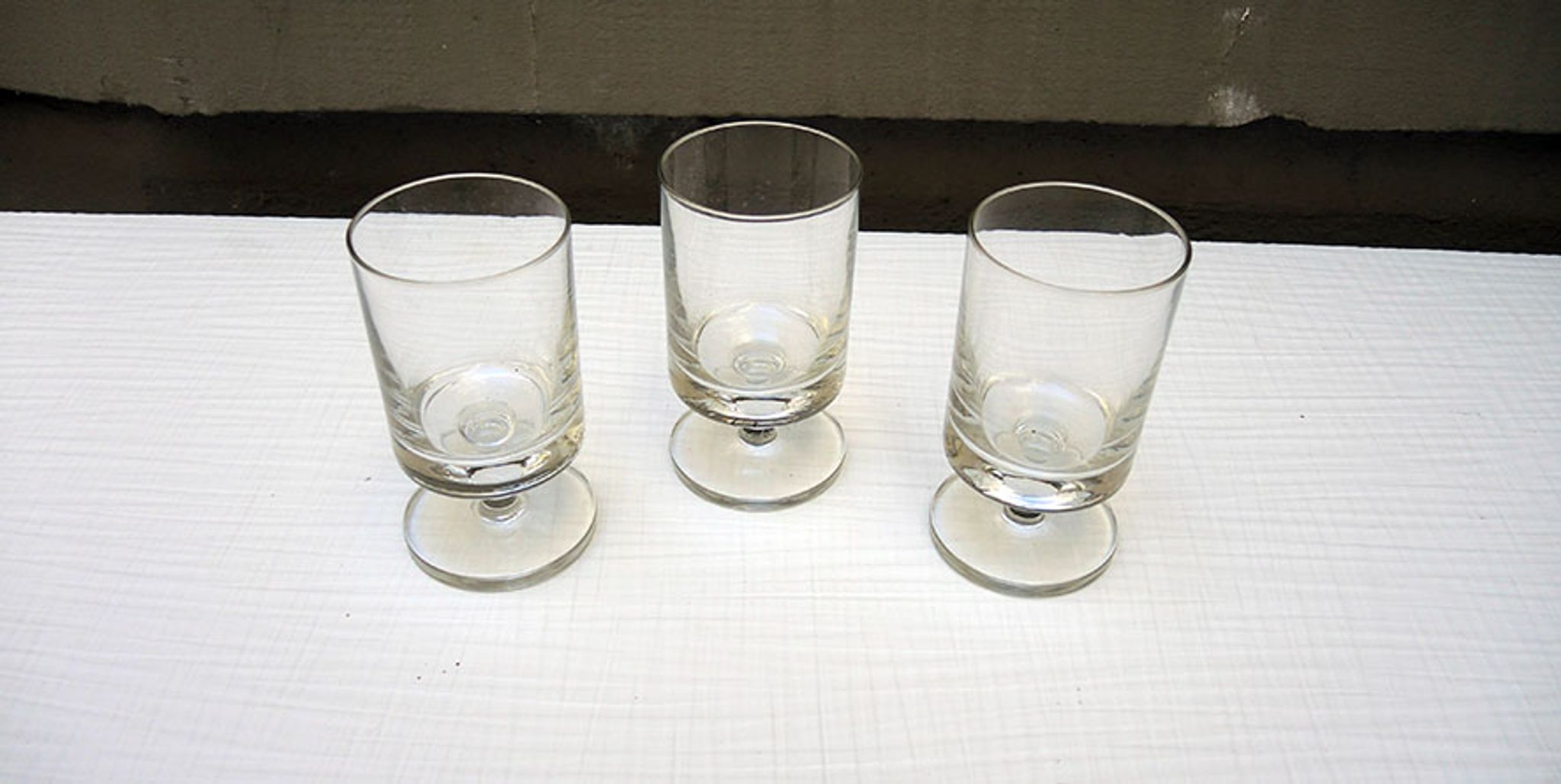 3 old transparent glass foot glasses