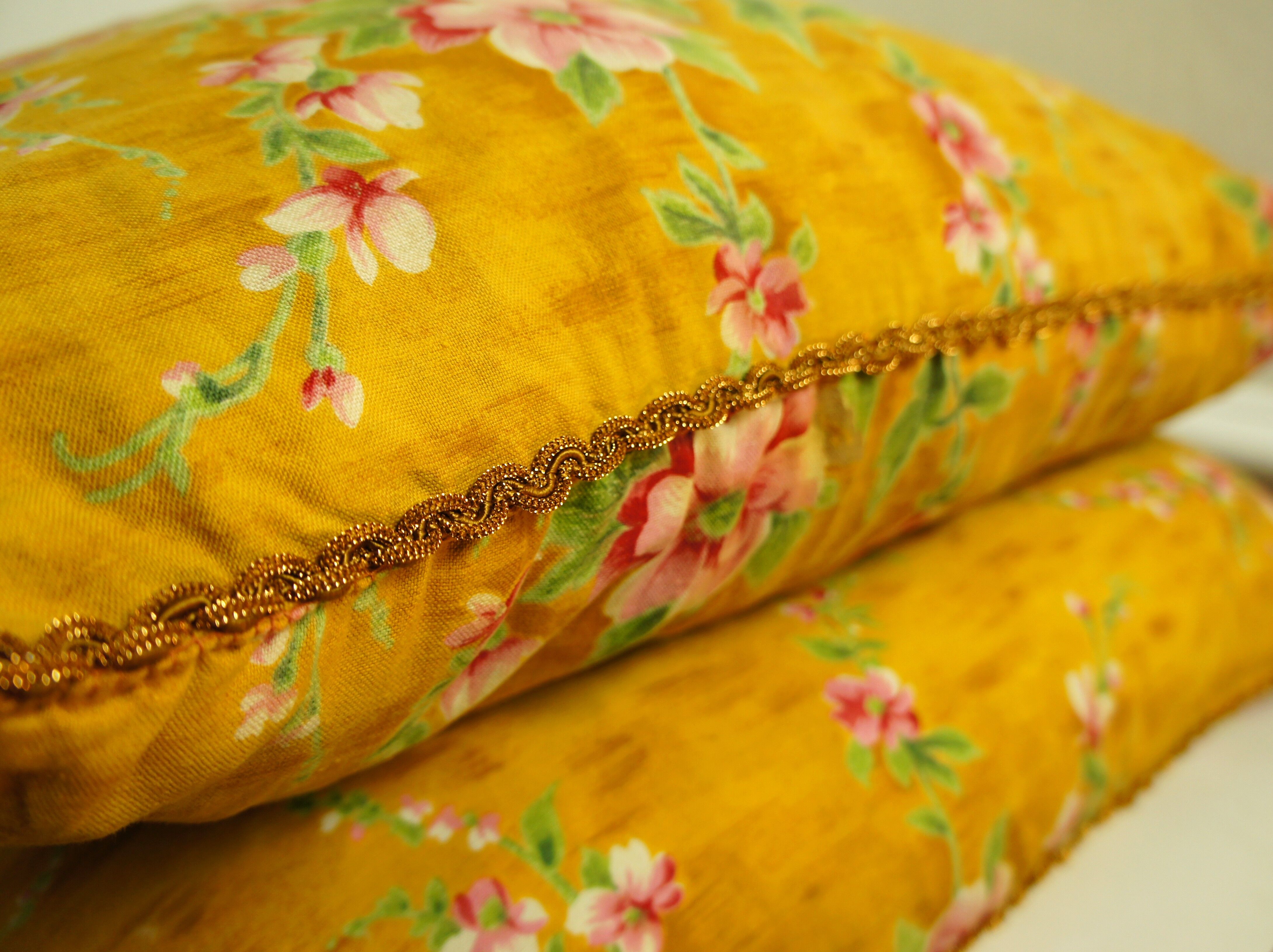 2 vintage ornate cushions