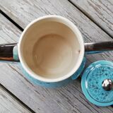 Semi blue teapot of silver flowers