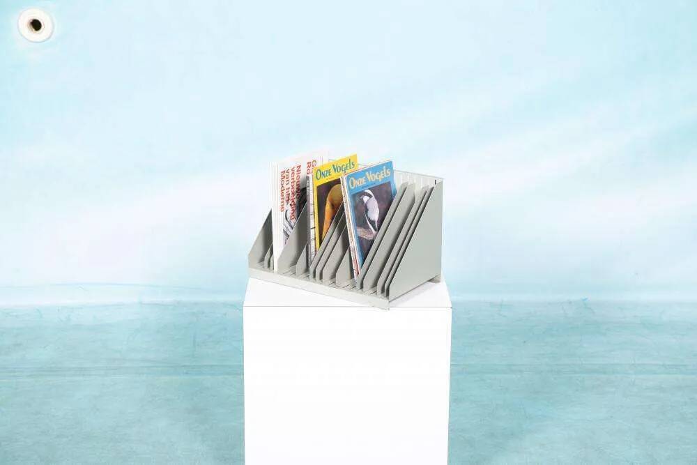 Vintage 1960s metal magazine rack, storage for single LPs.