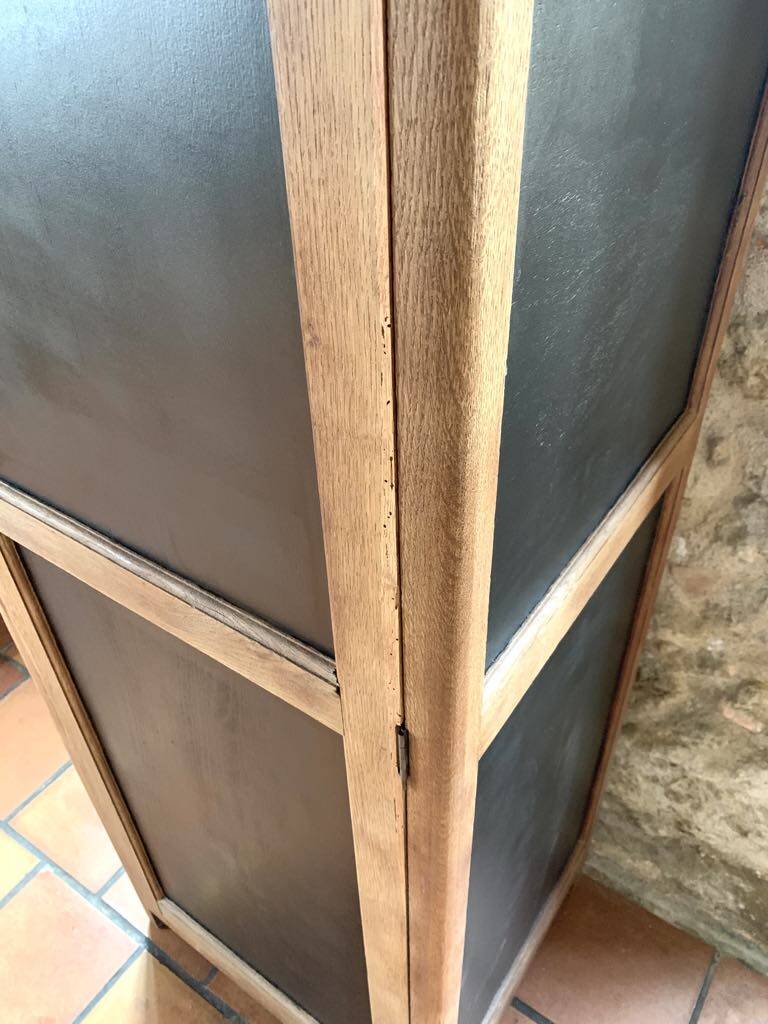 Vintage wooden wardrobe with matte cast iron color hanging rail