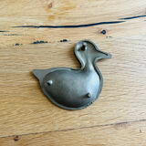 Small empty duck tin pocket
