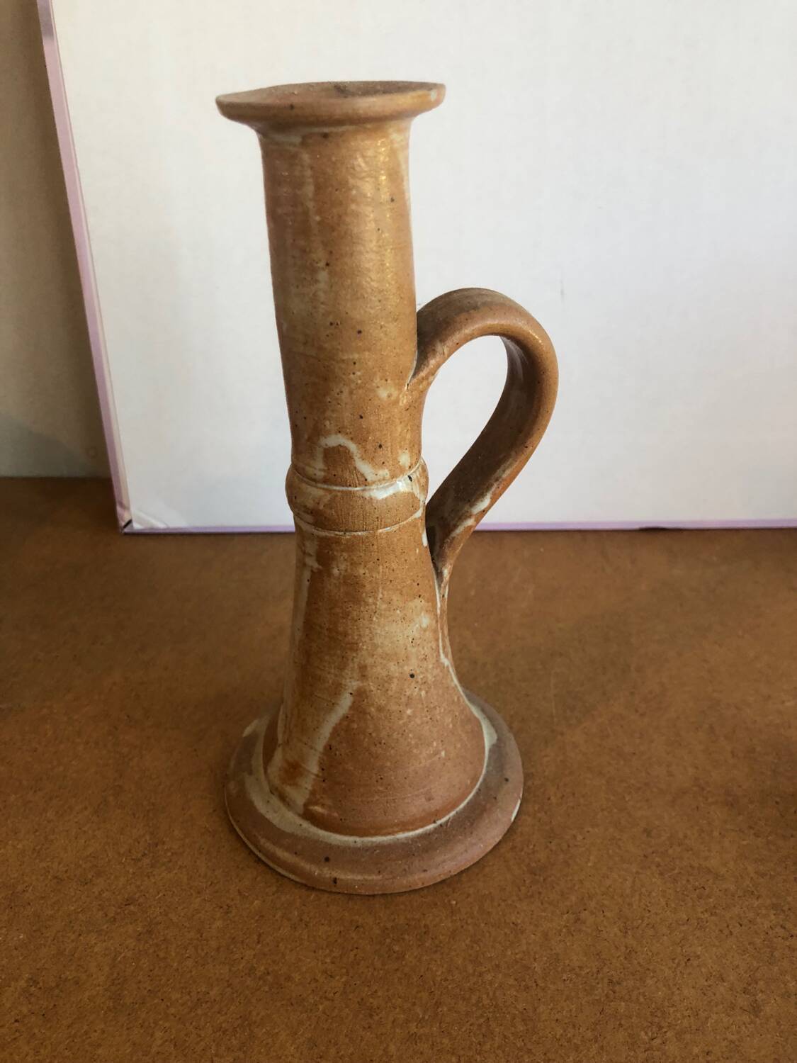 Pretty sandstone candle holder with handle
