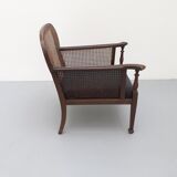 Colonial wooden armchair and cannage