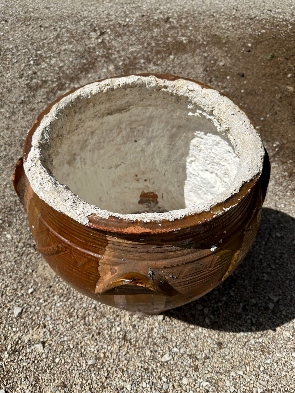 Ancient terracotta pottery jar