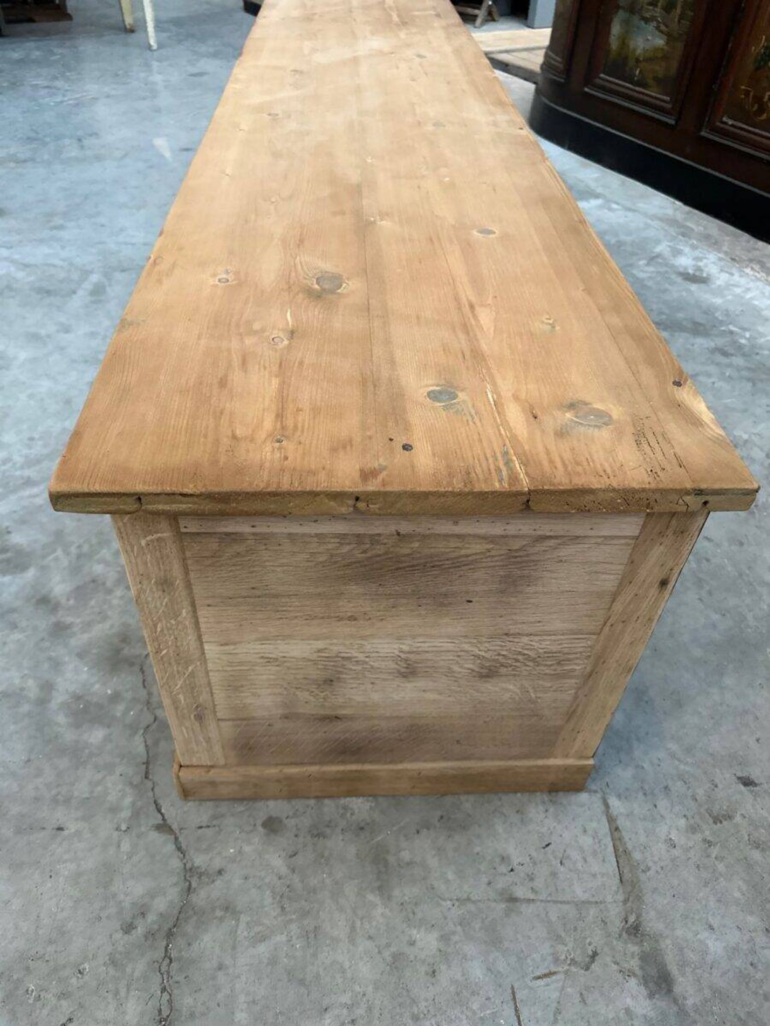 An old piece of workshop furniture transformed into a TV stand
