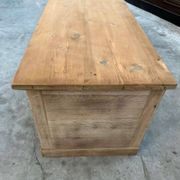 An old piece of workshop furniture transformed into a TV stand
