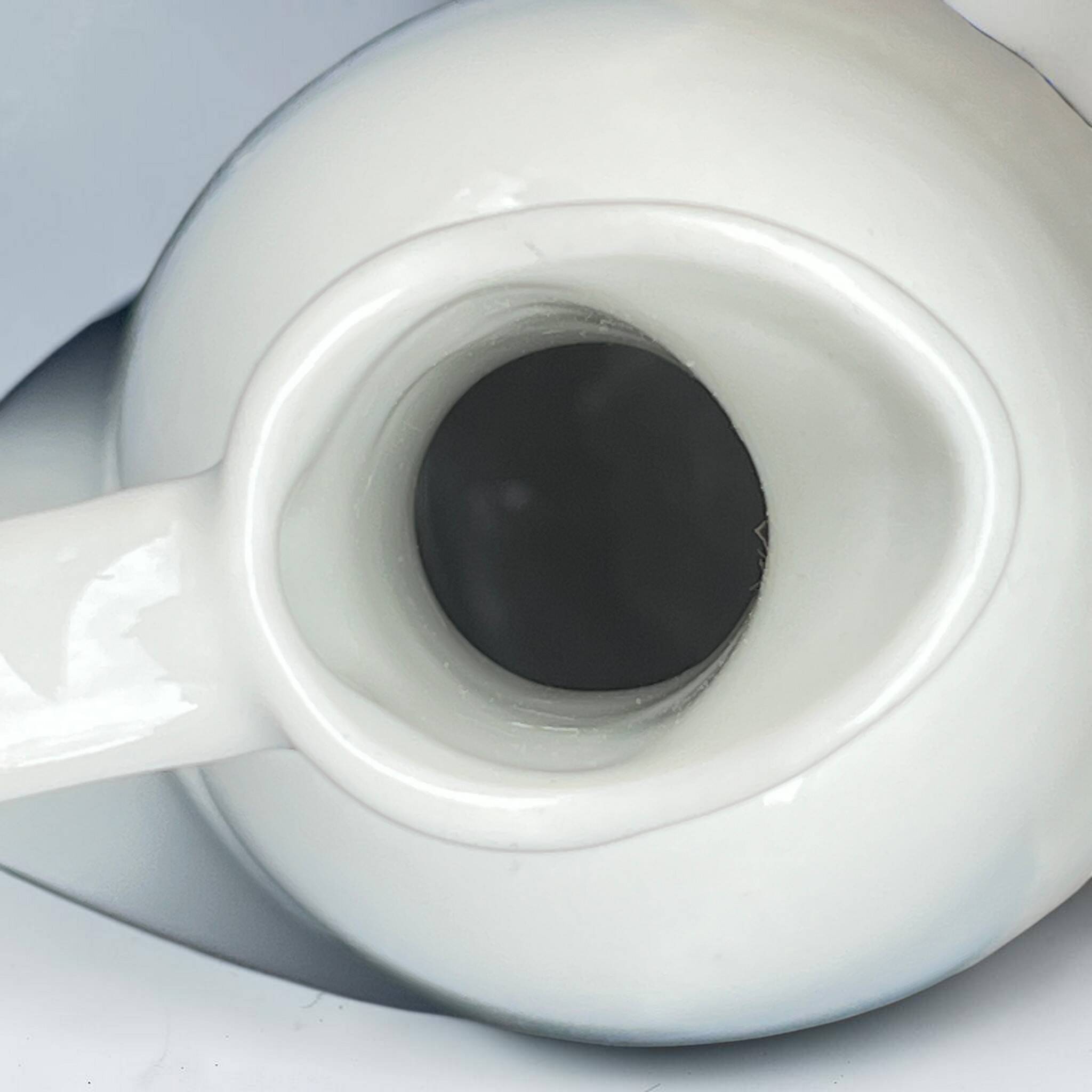 Modernist pitcher in vintage white porcelain water carafe in porcelain.