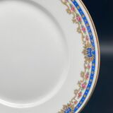 Limoges porcelain flat plates with blue border and small pink flowers