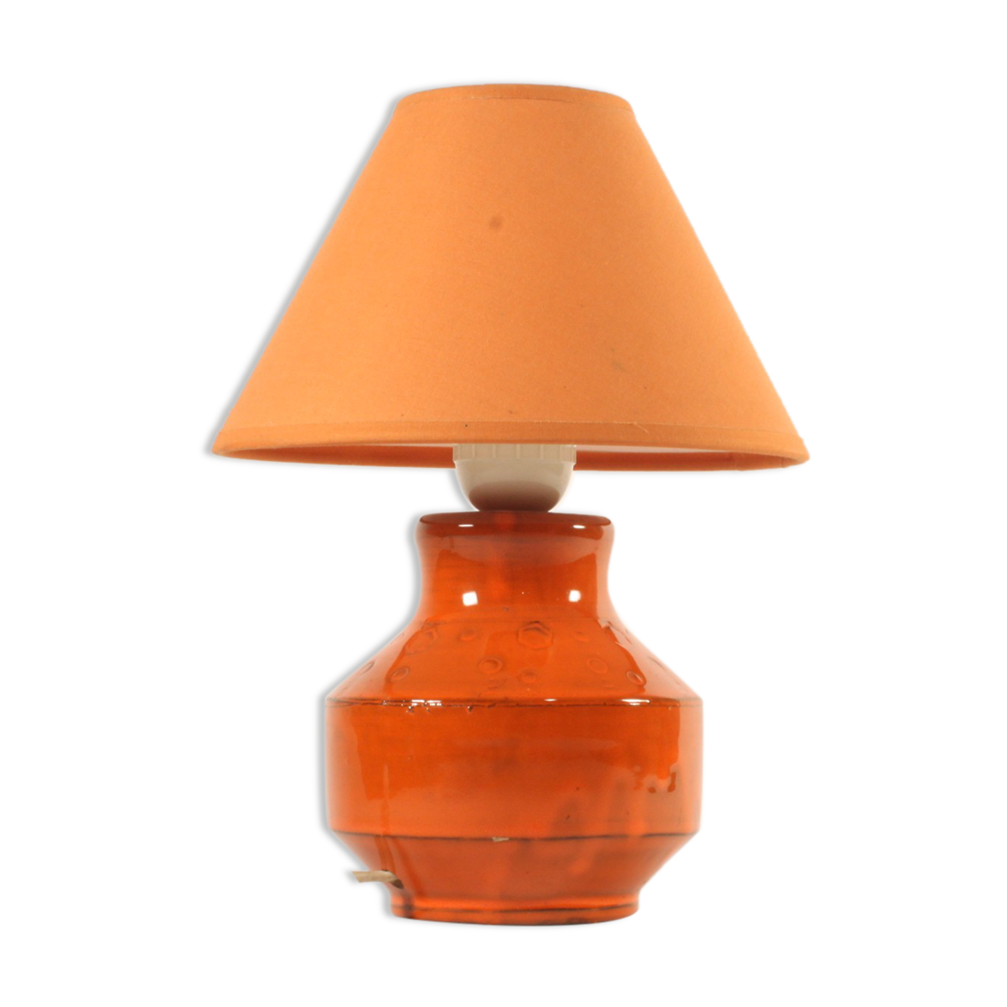 Orange ceramic table lamp with geometric imprints, 1970s.