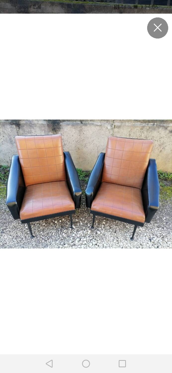 Pair of faux leather armchairs