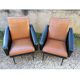 Paire de fauteuils en simili cuir