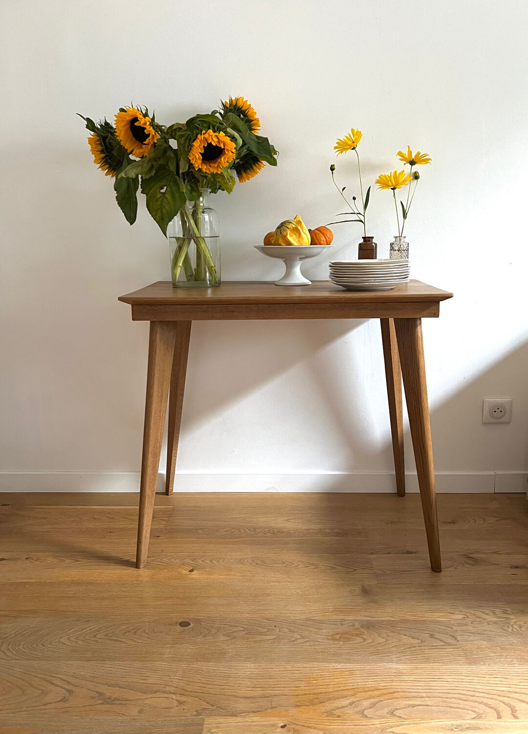 Side table with compass legs