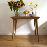 Side table with compass legs