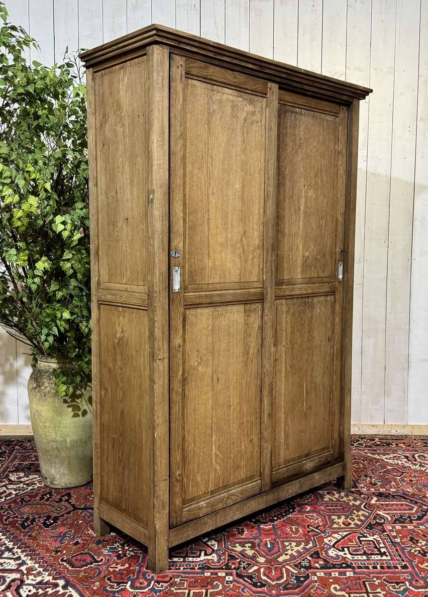 Oak wardrobe with sliding doors from the 1930s.